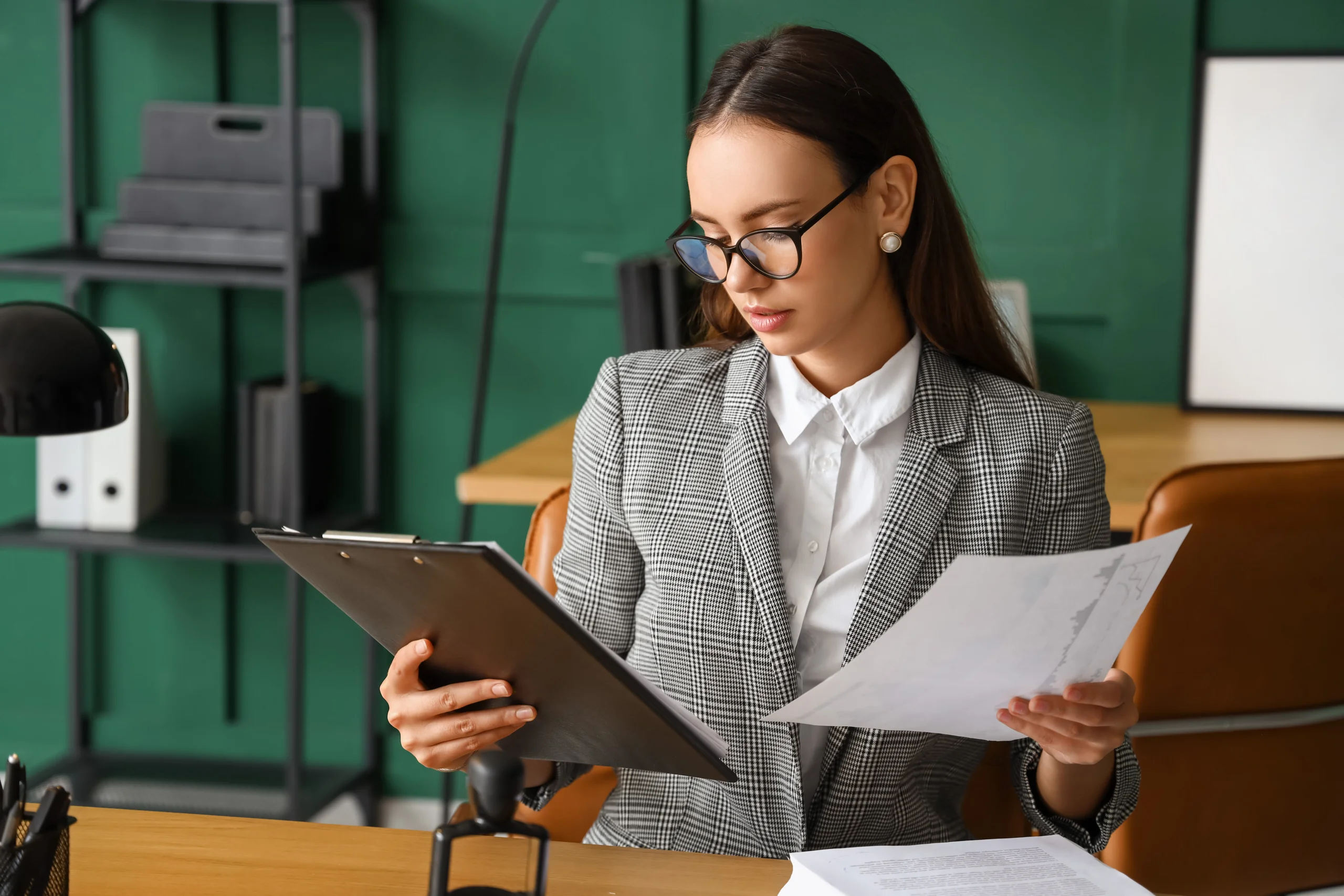 female notary public working in office female notary public working in office